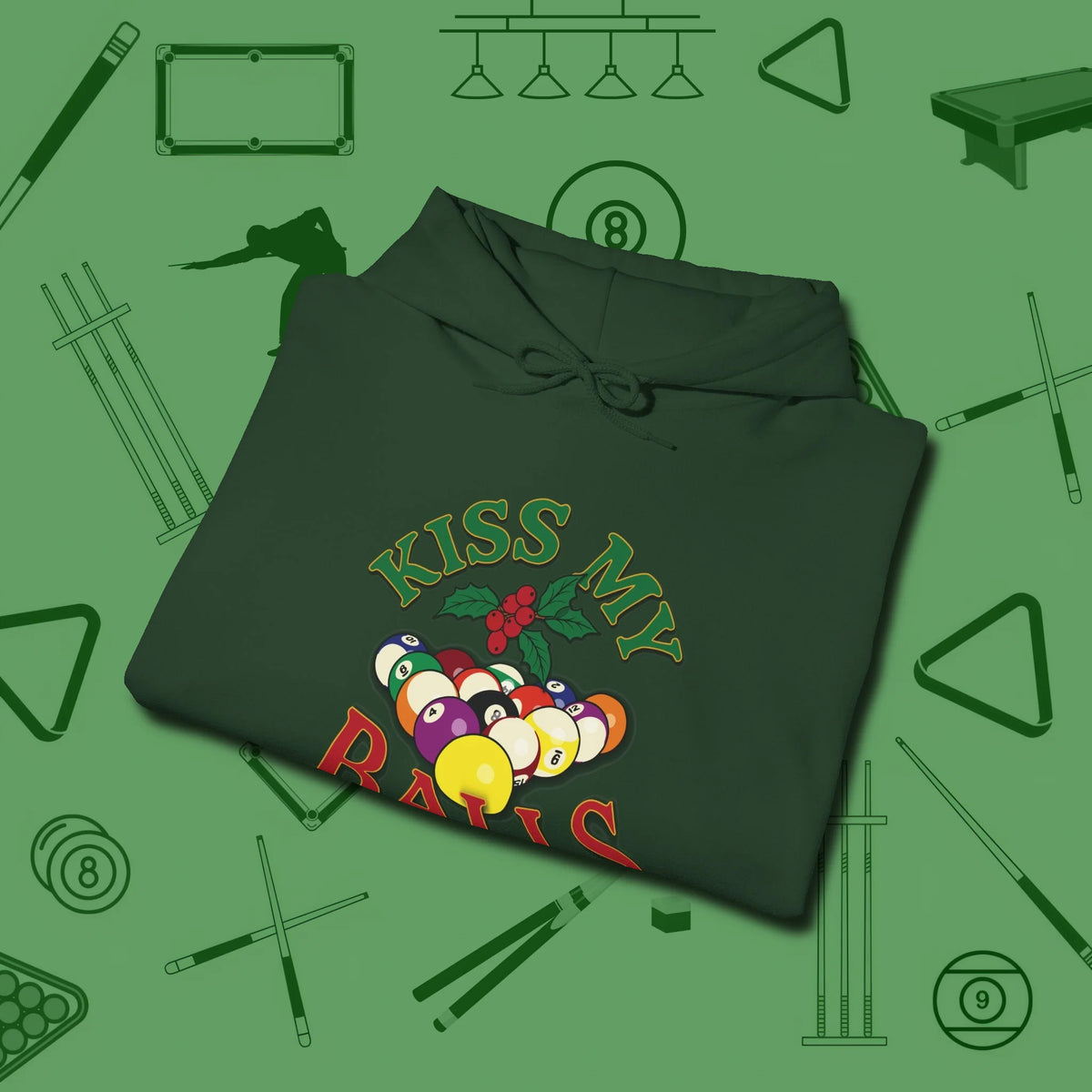 Kiss My Balls Holiday Hoodie, folded view, in Forest Green look good while calling your pocket