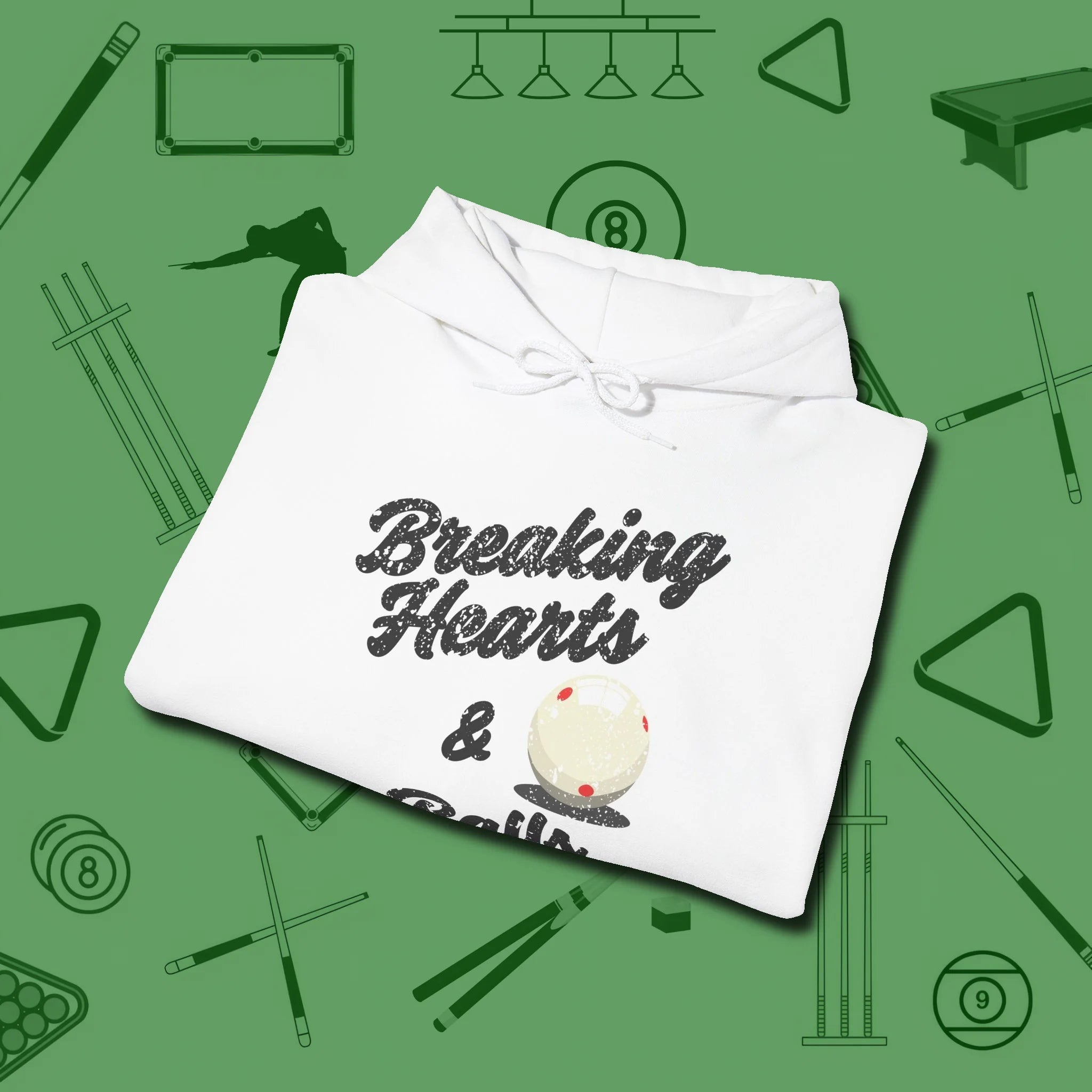 Breaking Hearts and Balls Hoodie, folded view, in White for players who live the game