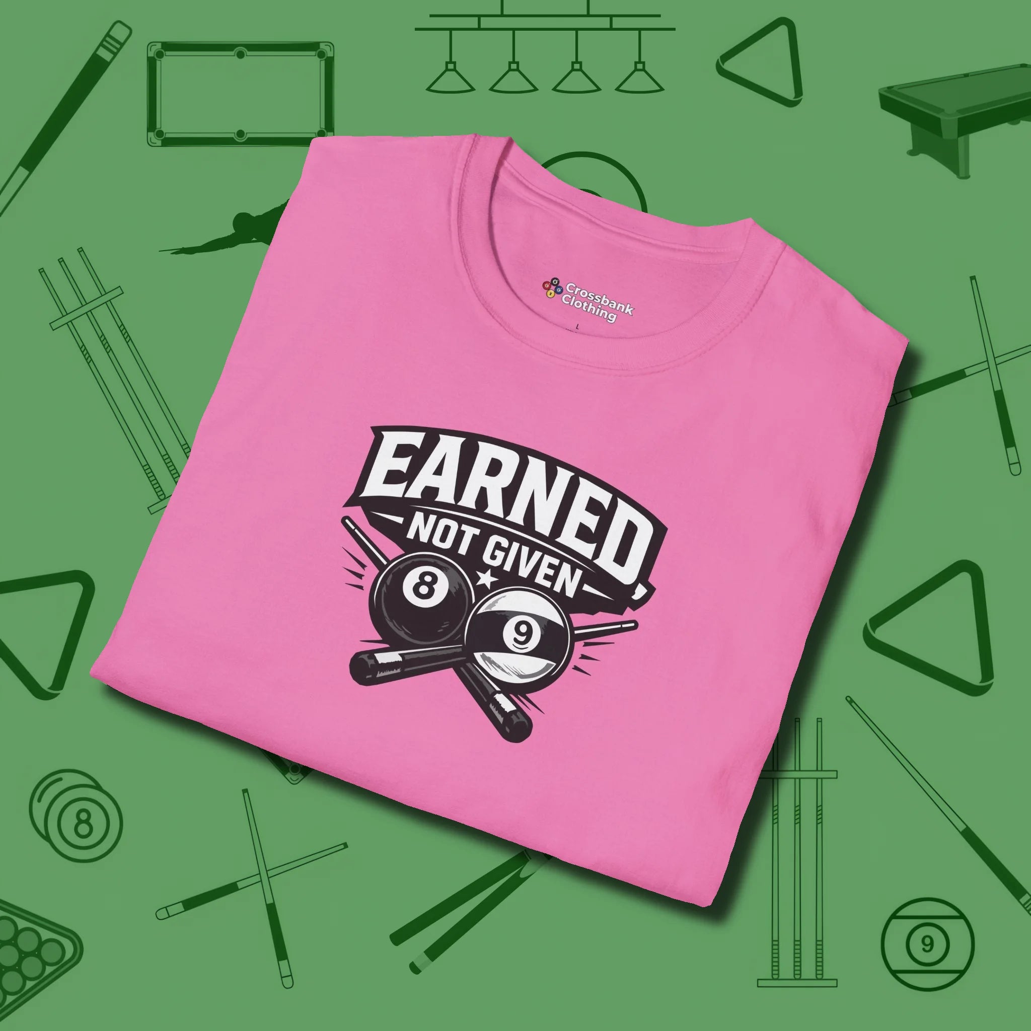 Earned Not Given T-Shirt, folded view, in Azalea because the table is your battlefield