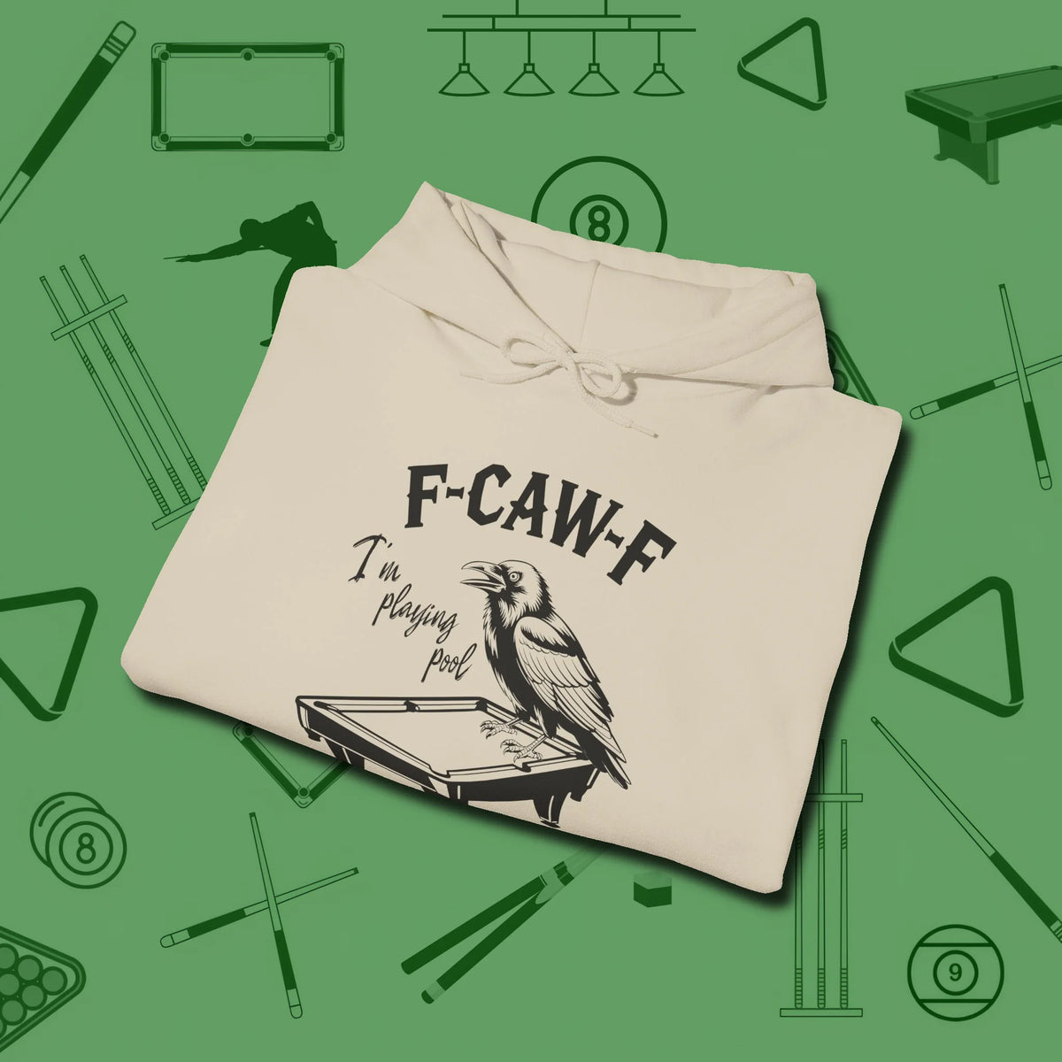 F-CAW-F Crow Hoodie, folded view, in Sand cool under pressure, hot on the eyes