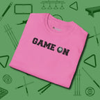 Game On Eight Ball T-Shirt, folded view, in Azalea cool enough for a corner pocket finish