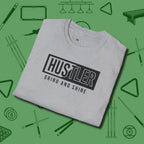 Hustler Grind and Shine T-Shirt, folded view, in Sport Grey because you don’t just play — you represent