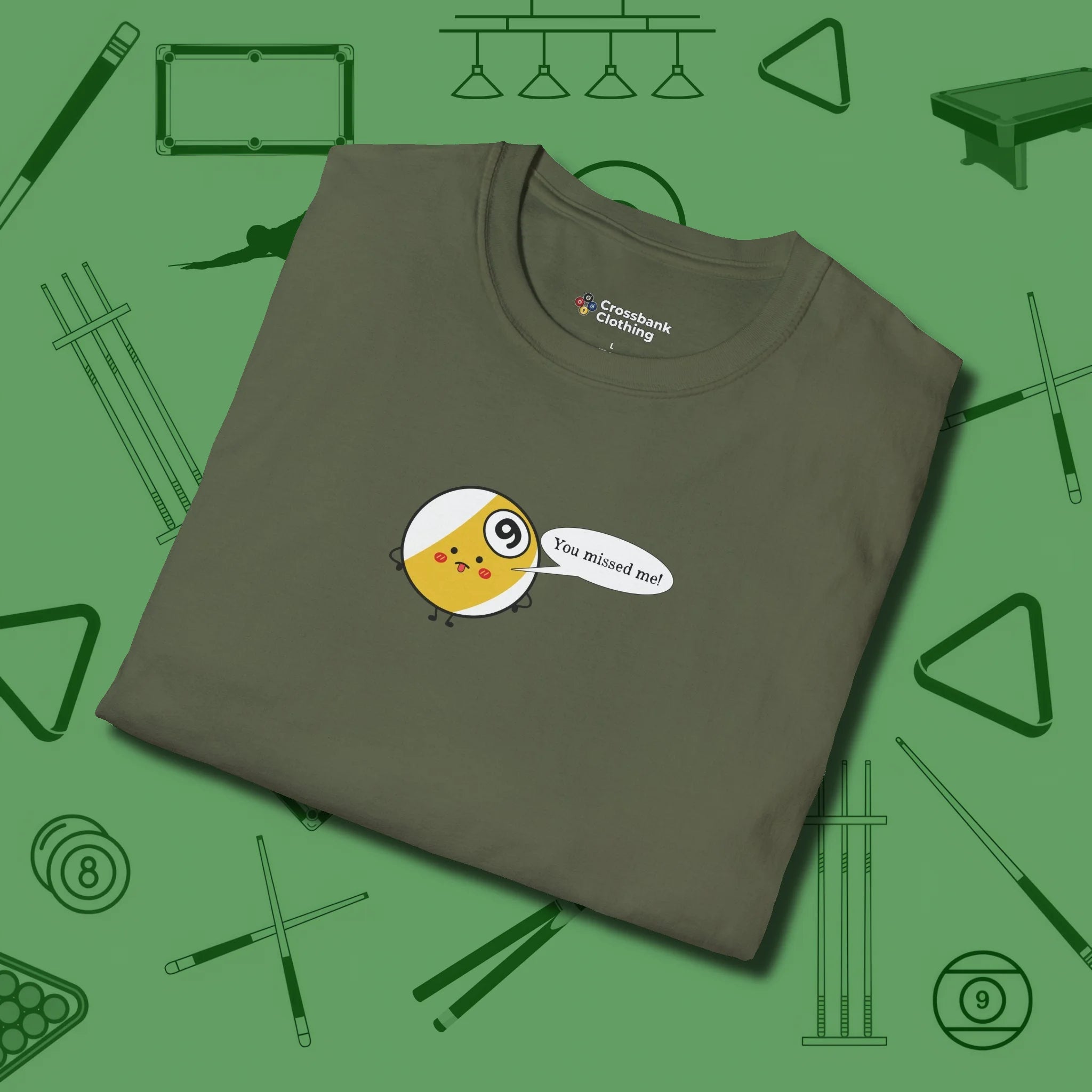 Missed Me Cartoon Nine Ball T-Shirt, folded view, in Military Green because you don’t just play — you represent