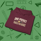 One Pocket Takes Patience Billiards Hoodie, folded view, in Maroon ideal for clean hits and clean fits