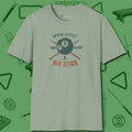 Speak Softly and Carry a Big Stick T-Shirt, front view, in Sage strike fear with swagger and precision