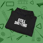 Still Shooting Hoodie, folded view, in Black dress for the shot you want to take