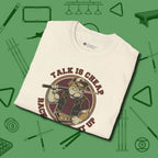 Talk is Cheap Billiards T-Shirt, folded view, in Natural because pool isn’t just a game — it’s who you are