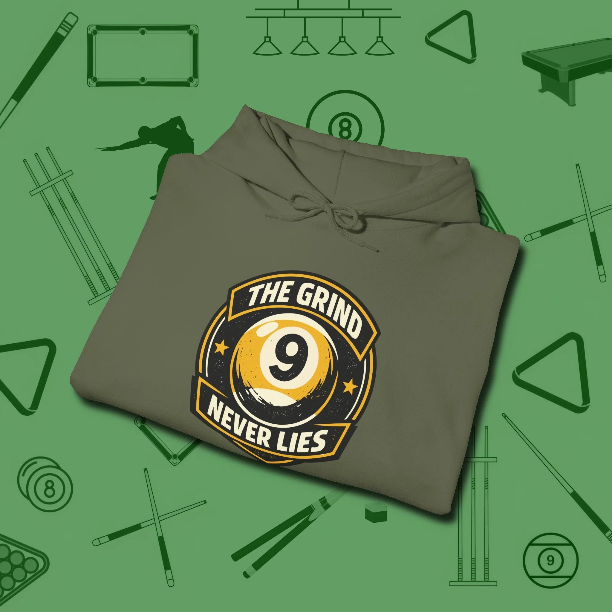 The Grind Never Lies Hoodie, folded view, in Military Green play in style, win in silence