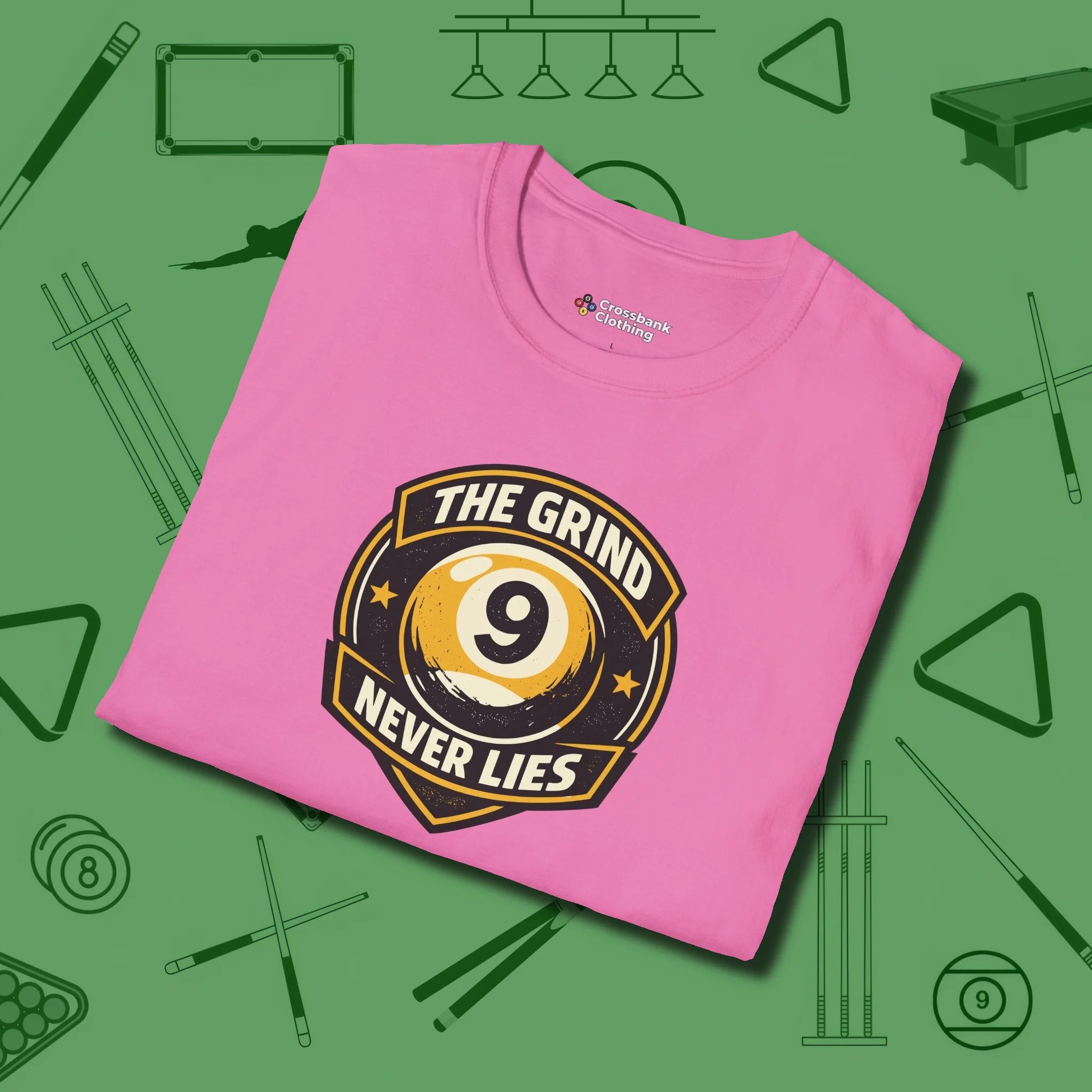 The Grind Never Lies T-Shirt, folded view, in Azalea perfect for players with quiet fire
