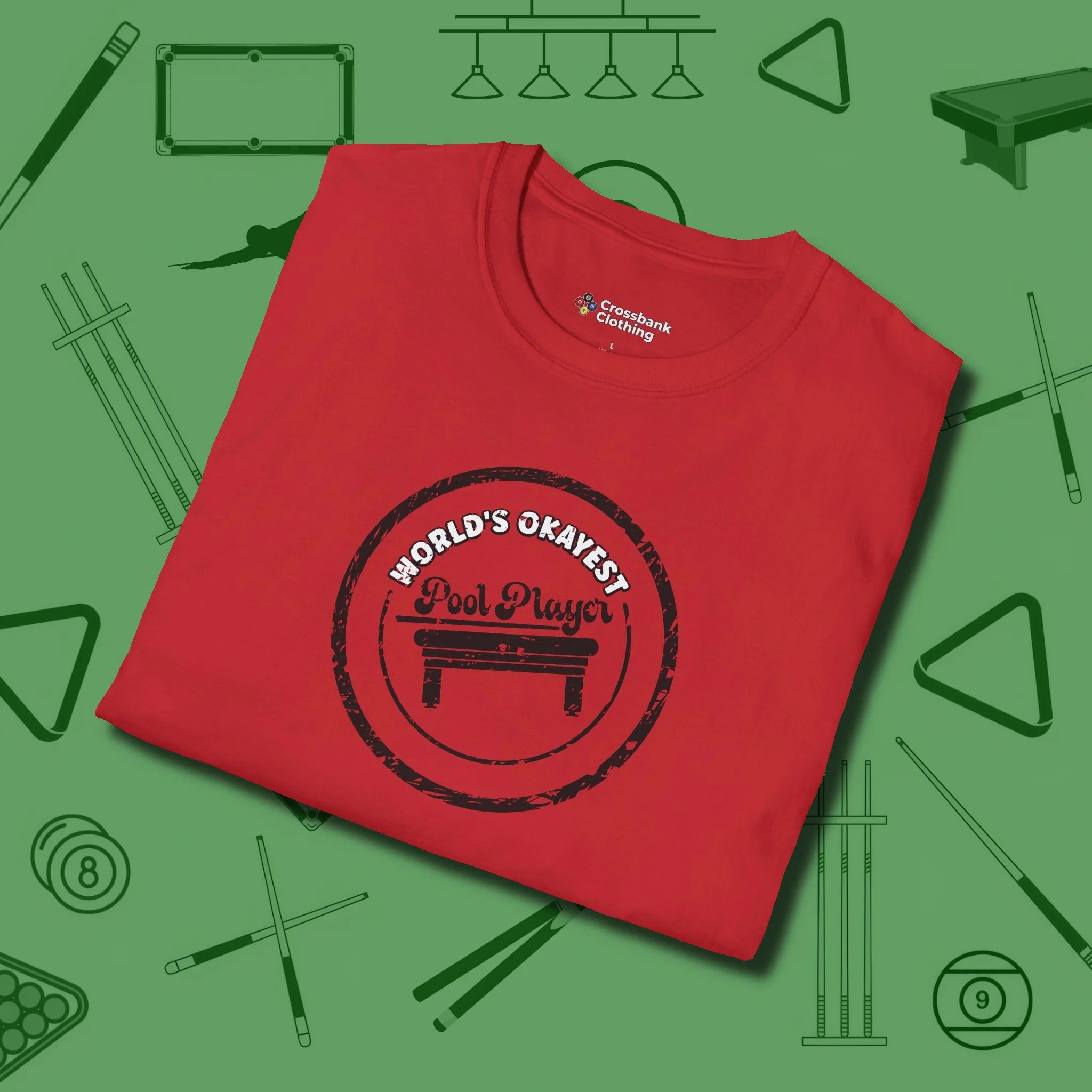 World's Okayest Stamp T-Shirt, folded view, in Red cool enough for a corner pocket finish